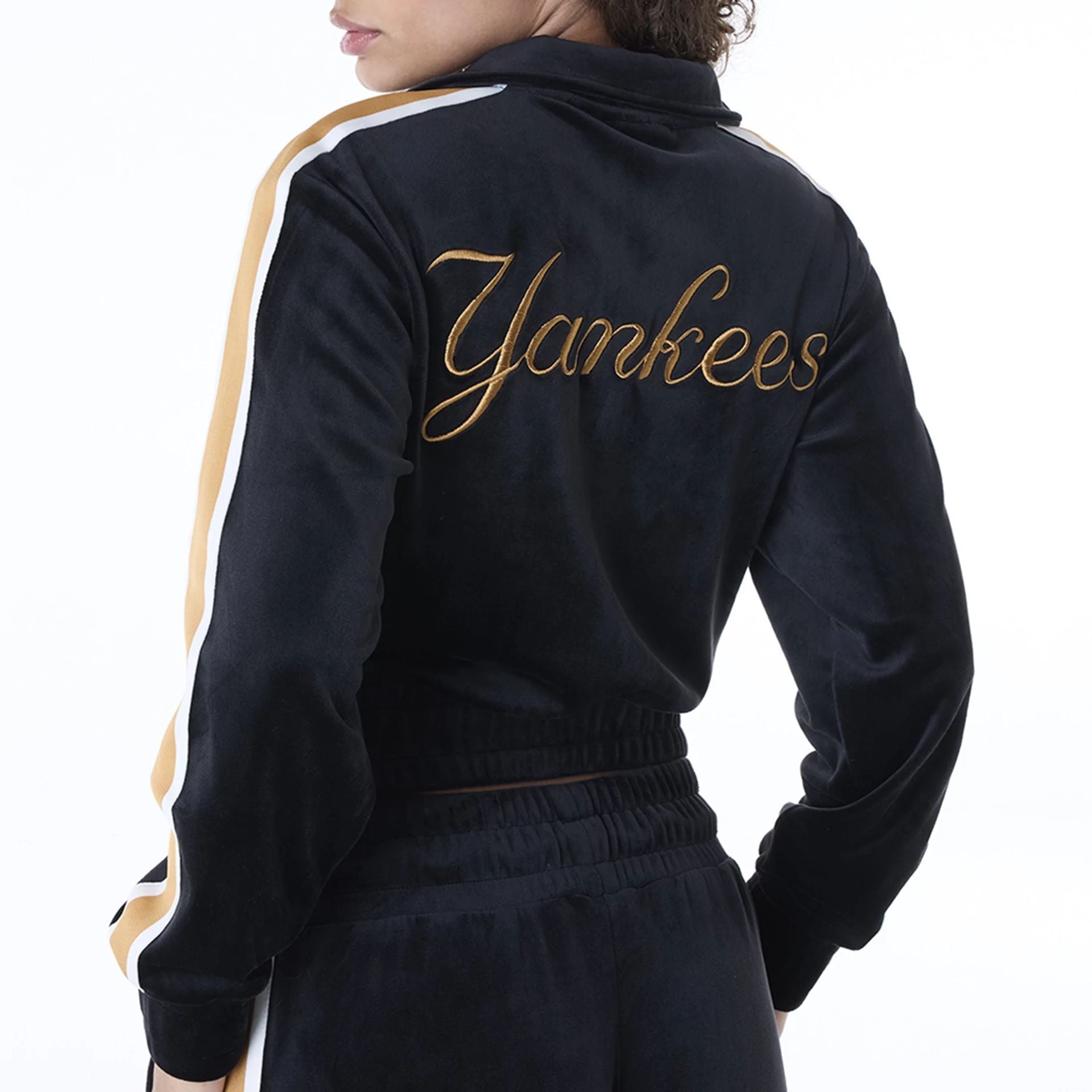 The Female model is wearing New York Yankees Womens MLB Velour Black Track Jacket 6