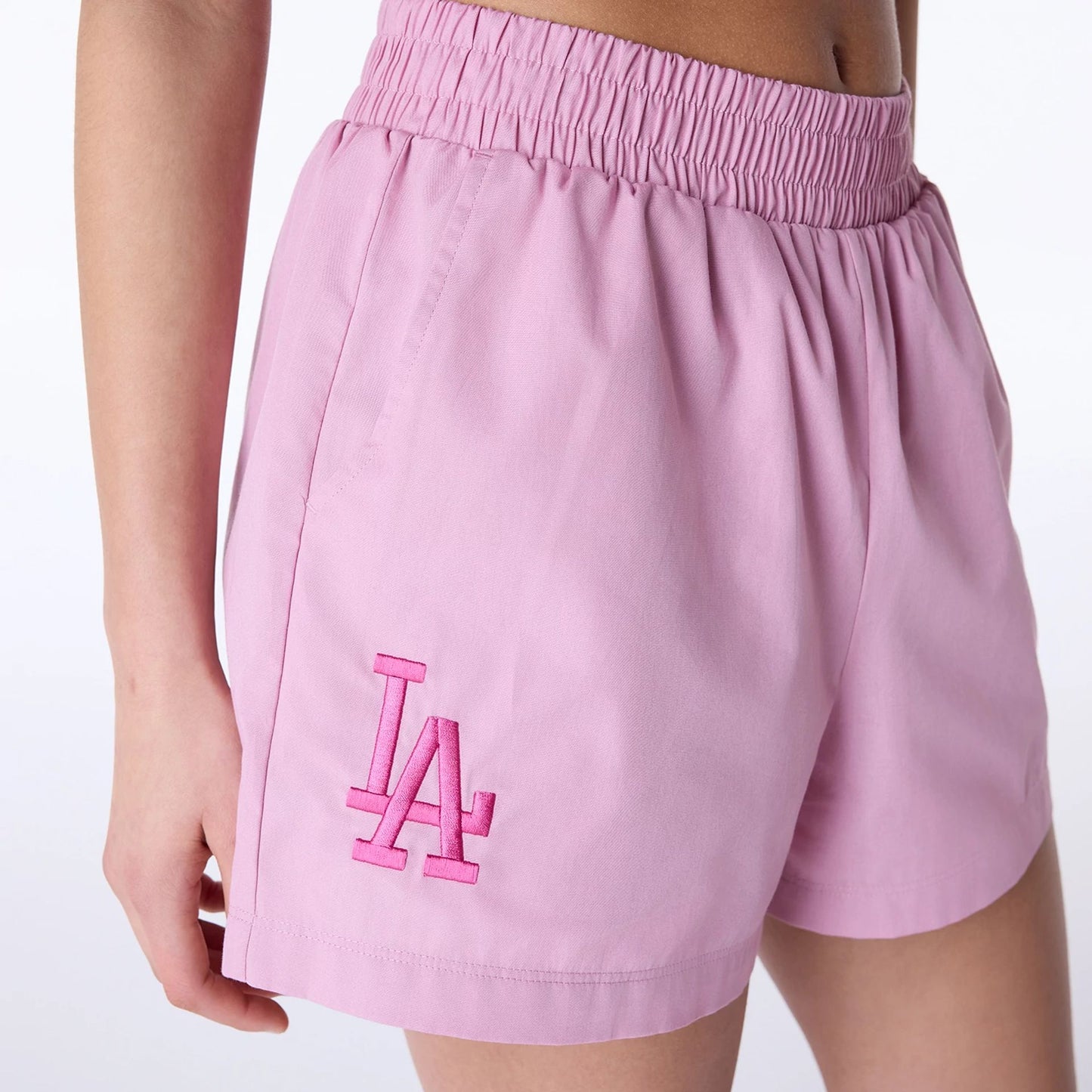 The Female model is wearing LA Dodgers Womens MLB Dark Pink Shorts 6