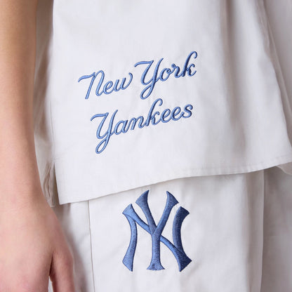 The Female model is wearing New York Yankees Womens MLB Script Revere Light Beige T-Shirt 3