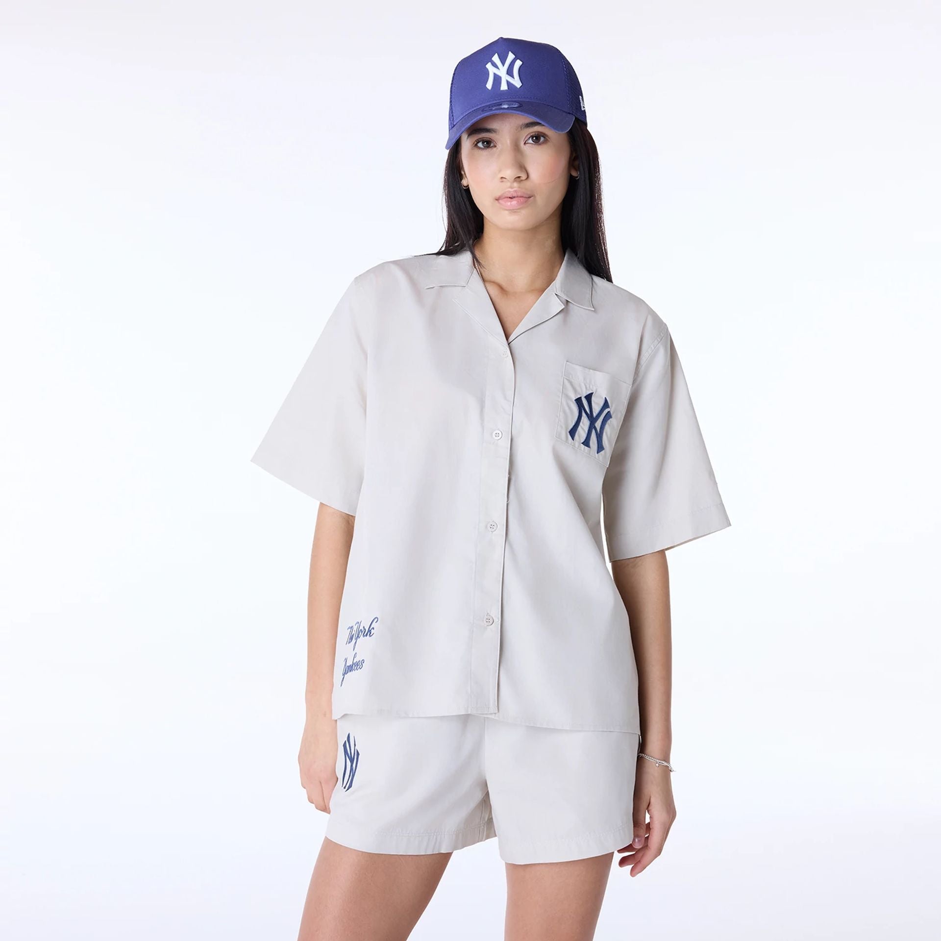 The Female model is wearing New York Yankees Womens MLB Script Revere Light Beige T-Shirt 1