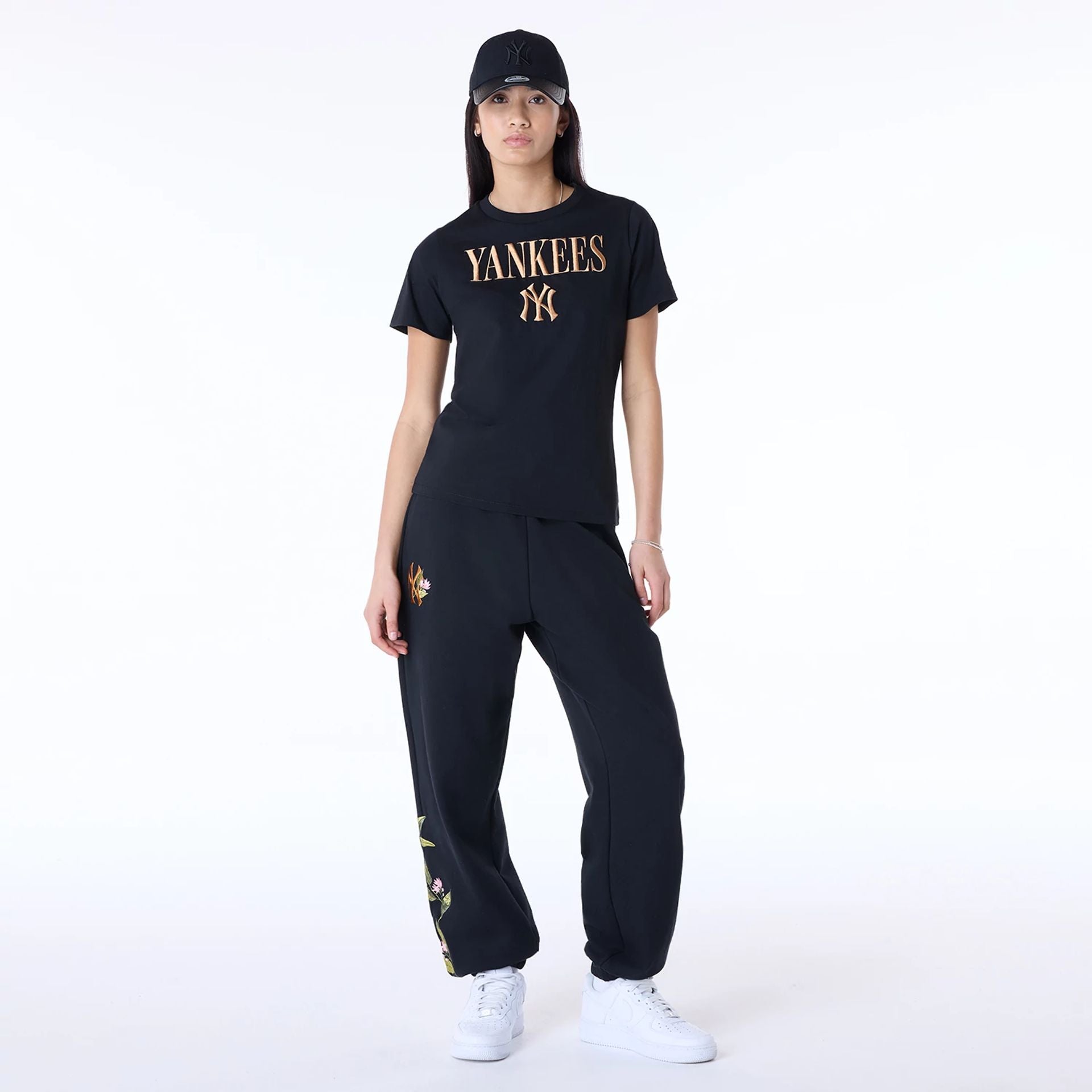 The Female model is wearing New York Yankees Womens MLB Floral Black Joggers 6