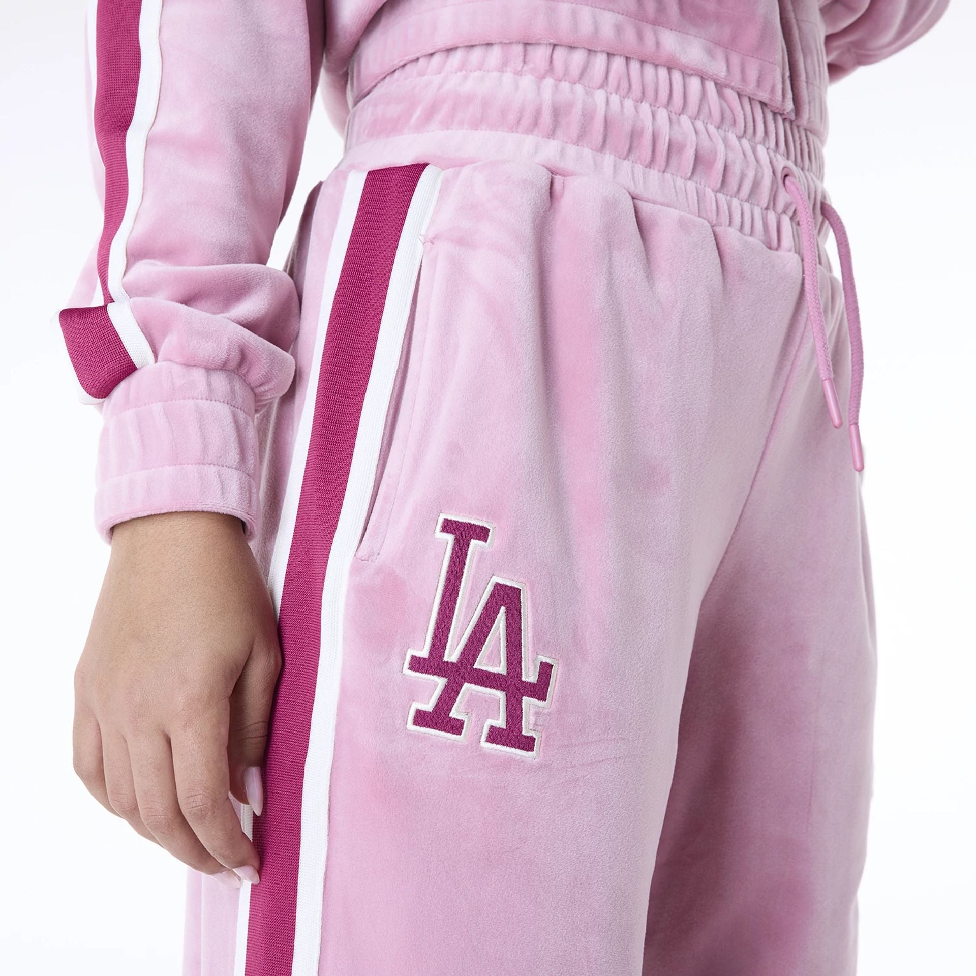 The Female model is wearing LA Dodgers Womens MLB Velour Dark Pink Joggers 2