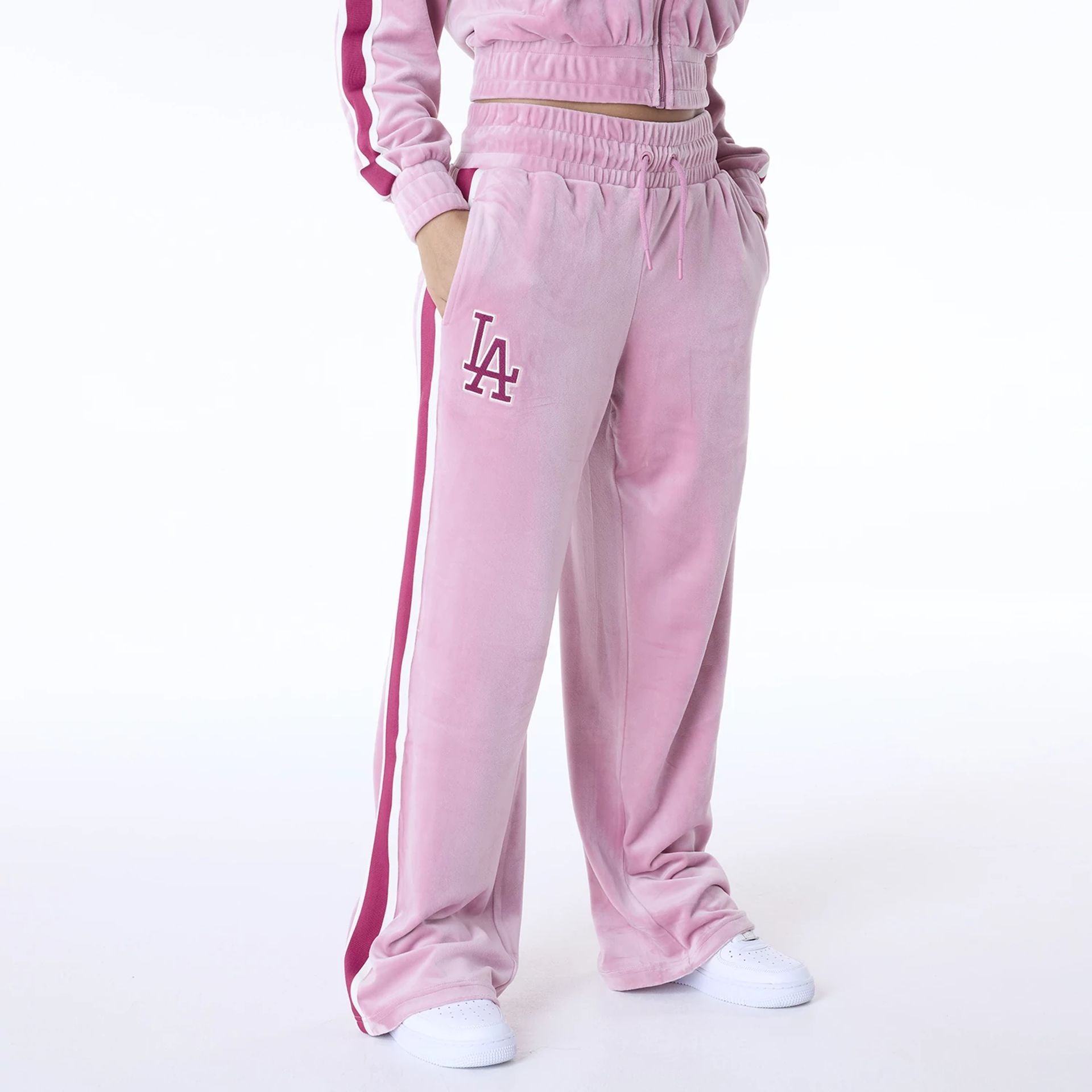 The Female model is wearing LA Dodgers Womens MLB Velour Dark Pink Joggers 1