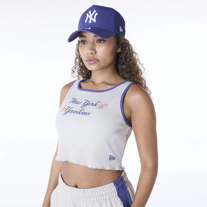 The Female model is wearing New York Yankees Womens MLB Floral Light Beige Vest 6