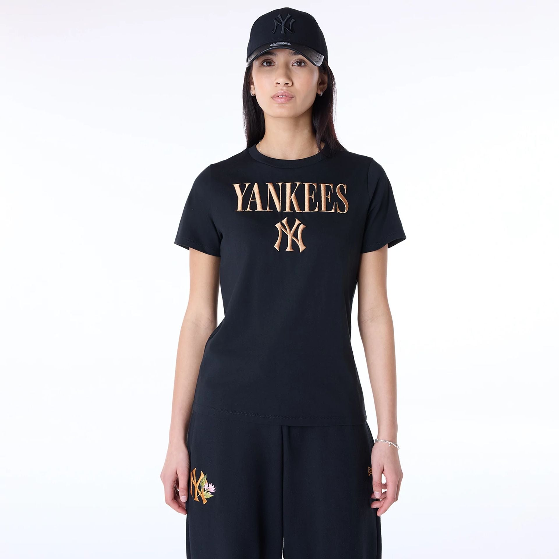 The Female model is wearing New York Yankees Womens MLB Black T-Shirt 1