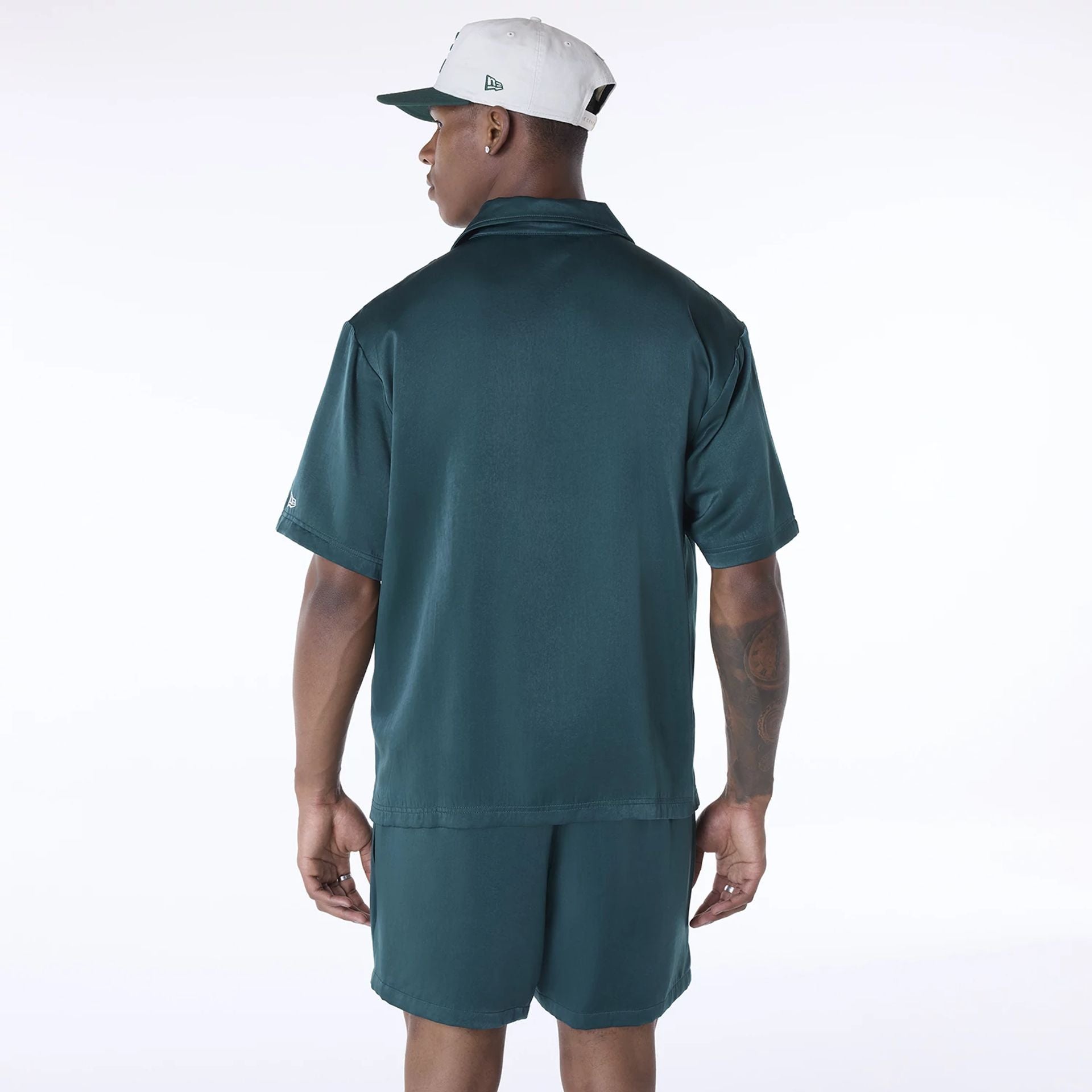 The Male model is wearing New Era Stripe Revere Dark Green Short Sleeve Shirt 2