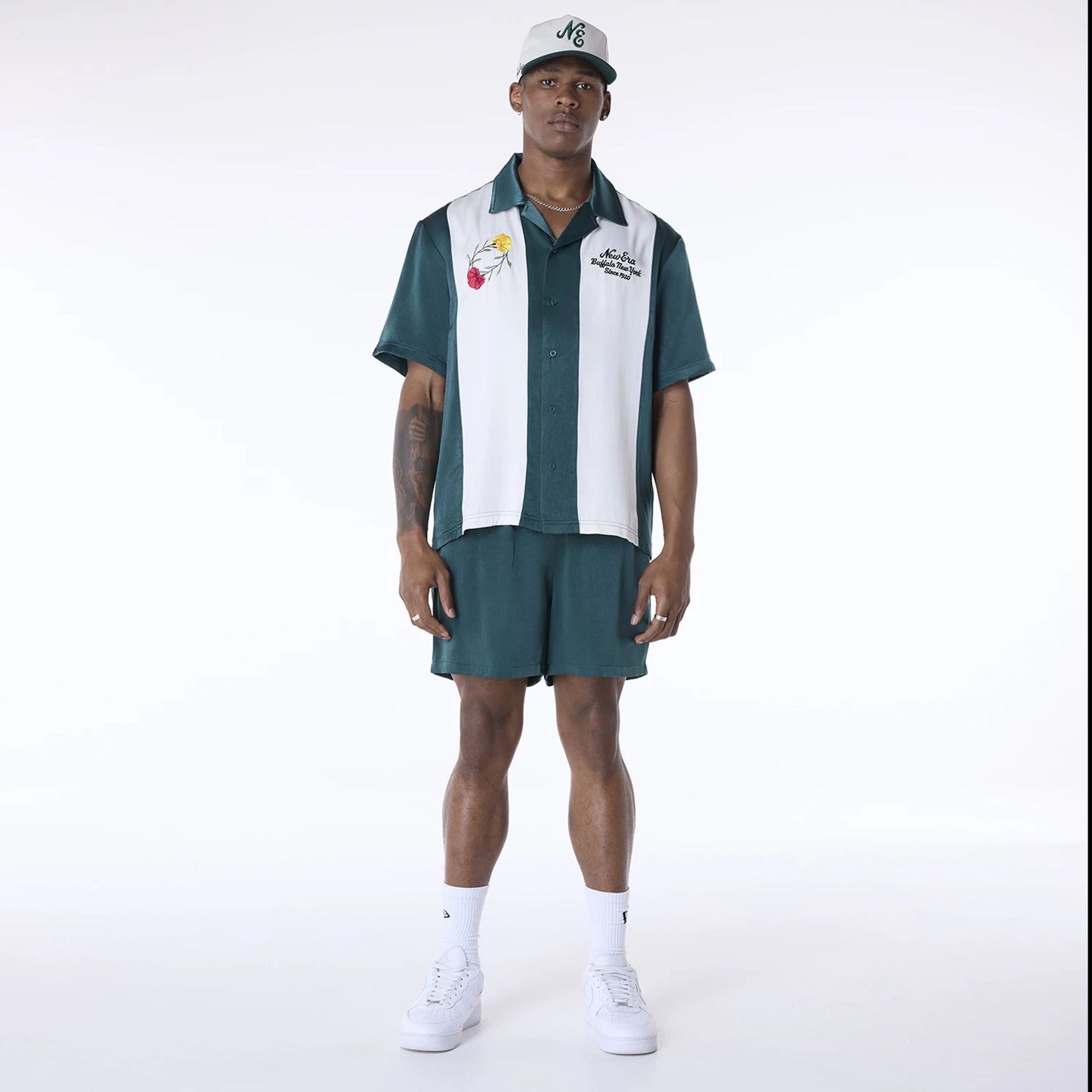 The Male model is wearing New Era Stripe Revere Dark Green Short Sleeve Shirt 3