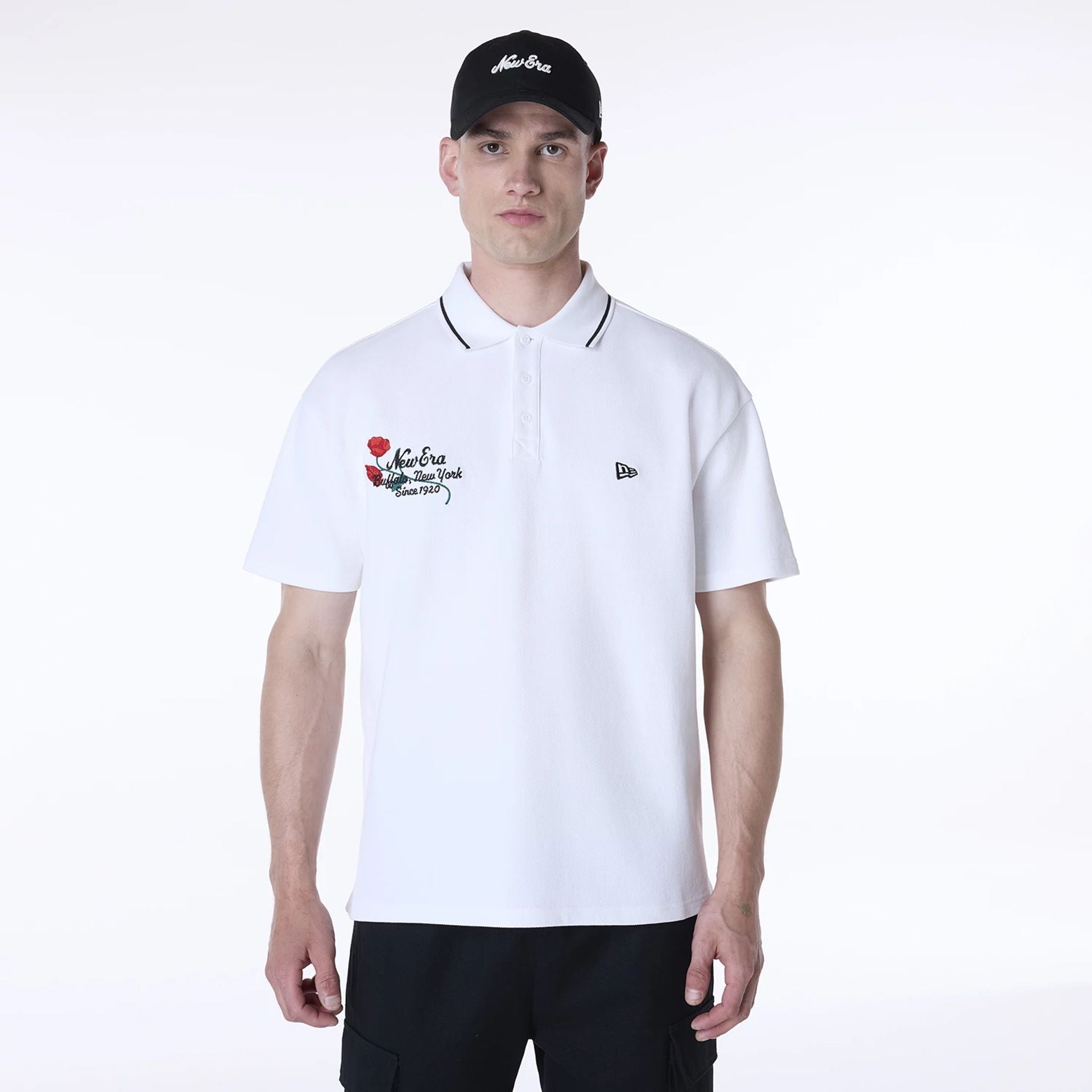 The Male model is wearing New Era Floral Polo White T-Shirt 1