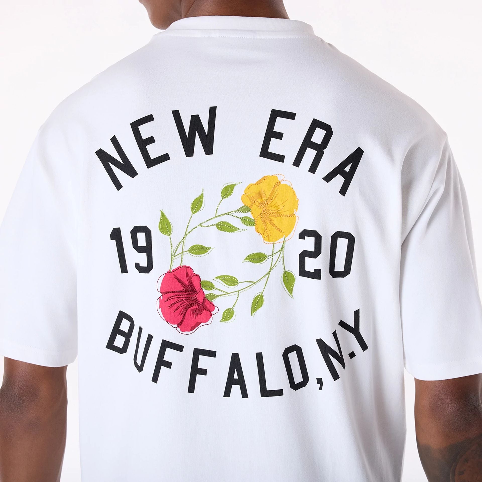 The Male model is wearing New Era Floral Graphic White T-Shirt 4