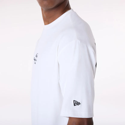 The Male model is wearing New Era Floral Graphic White T-Shirt 7