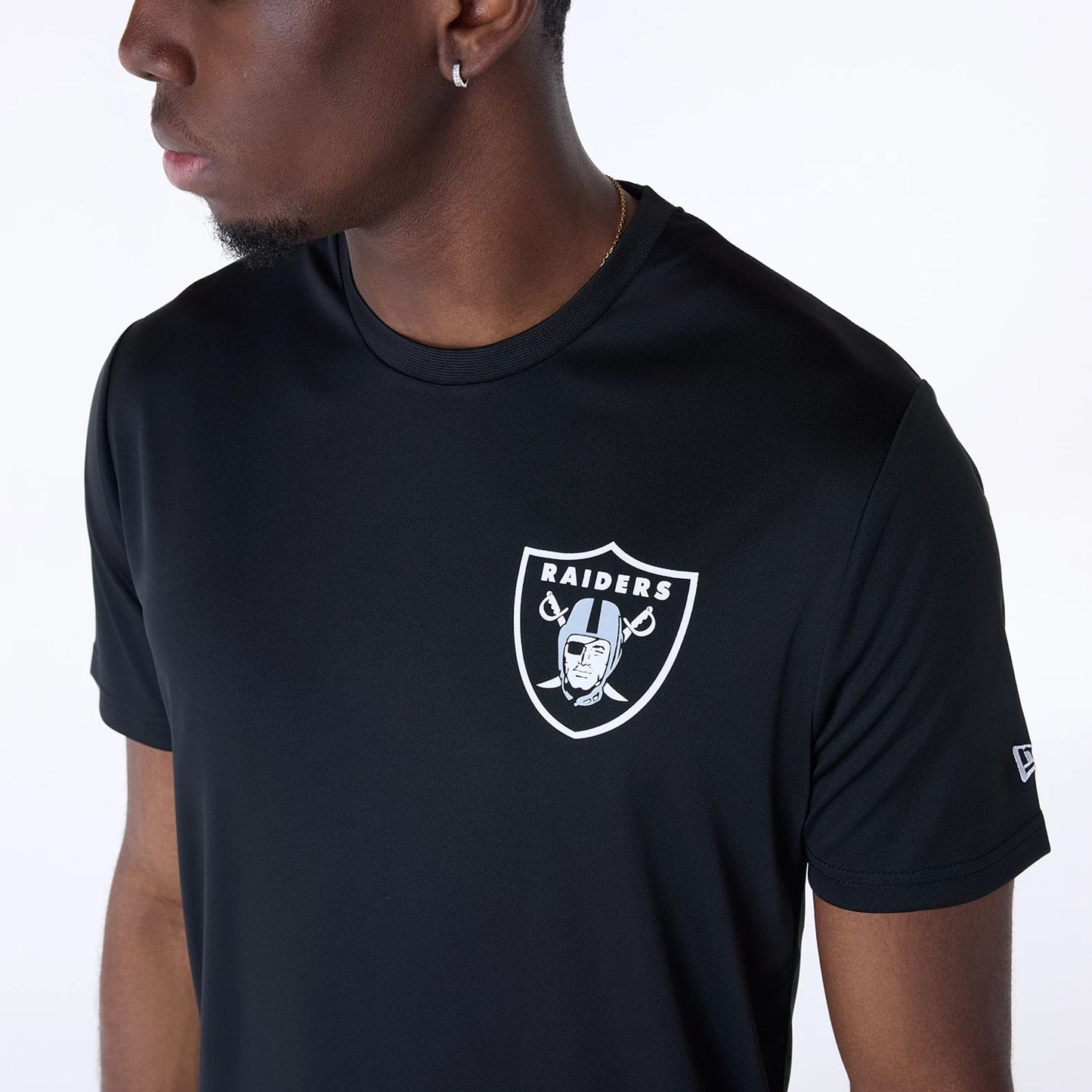 The Male model is wearing Las Vegas Raiders NFL Essentials Black T-Shirt 7