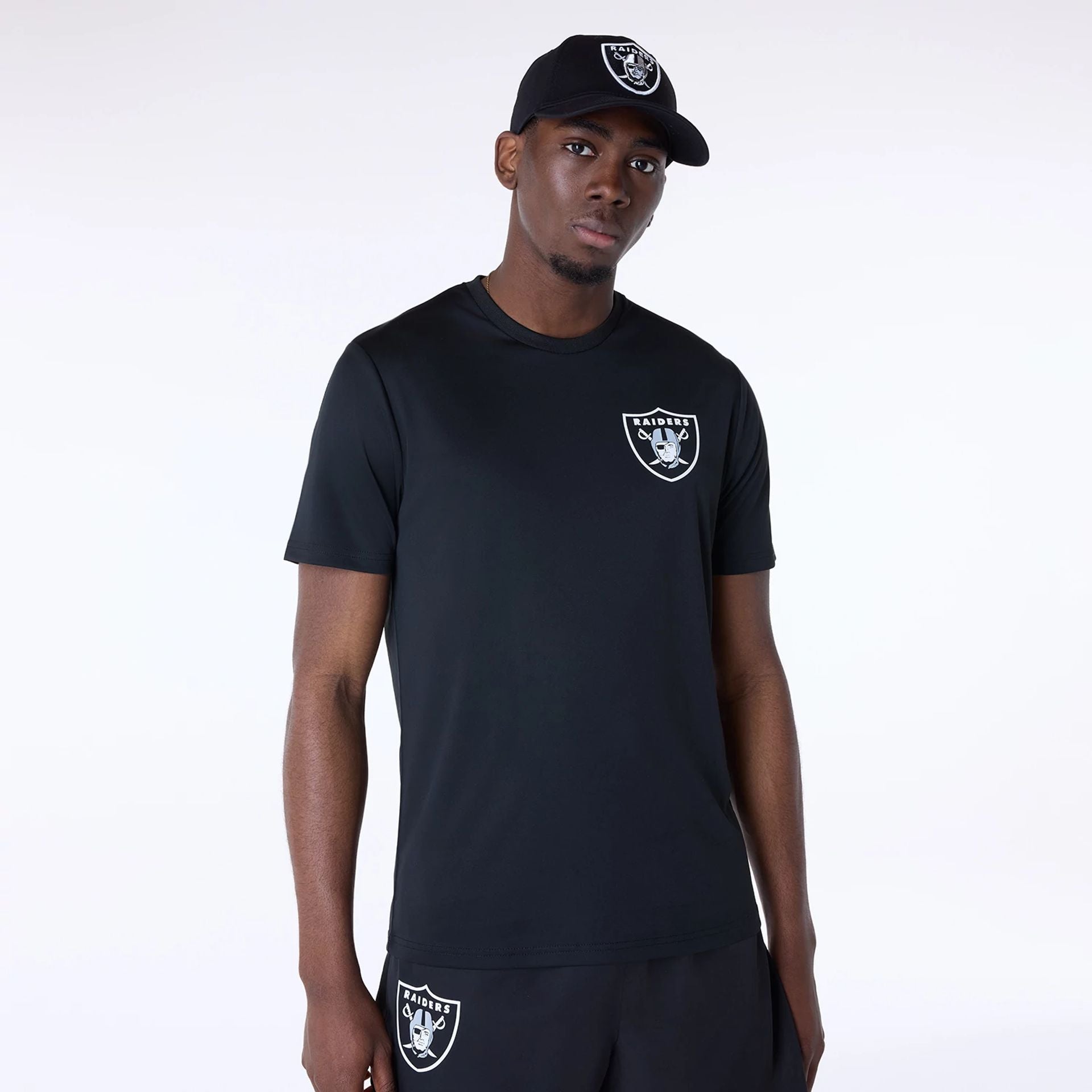 The Male model is wearing Las Vegas Raiders NFL Essentials Black T-Shirt 1