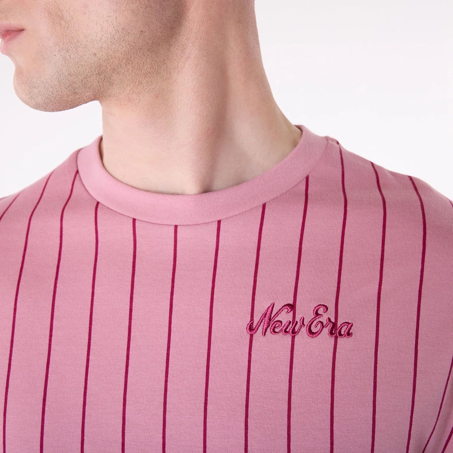 The Male model is wearing New Era Pinstripe Dark Pink Oversized T-Shirt 7