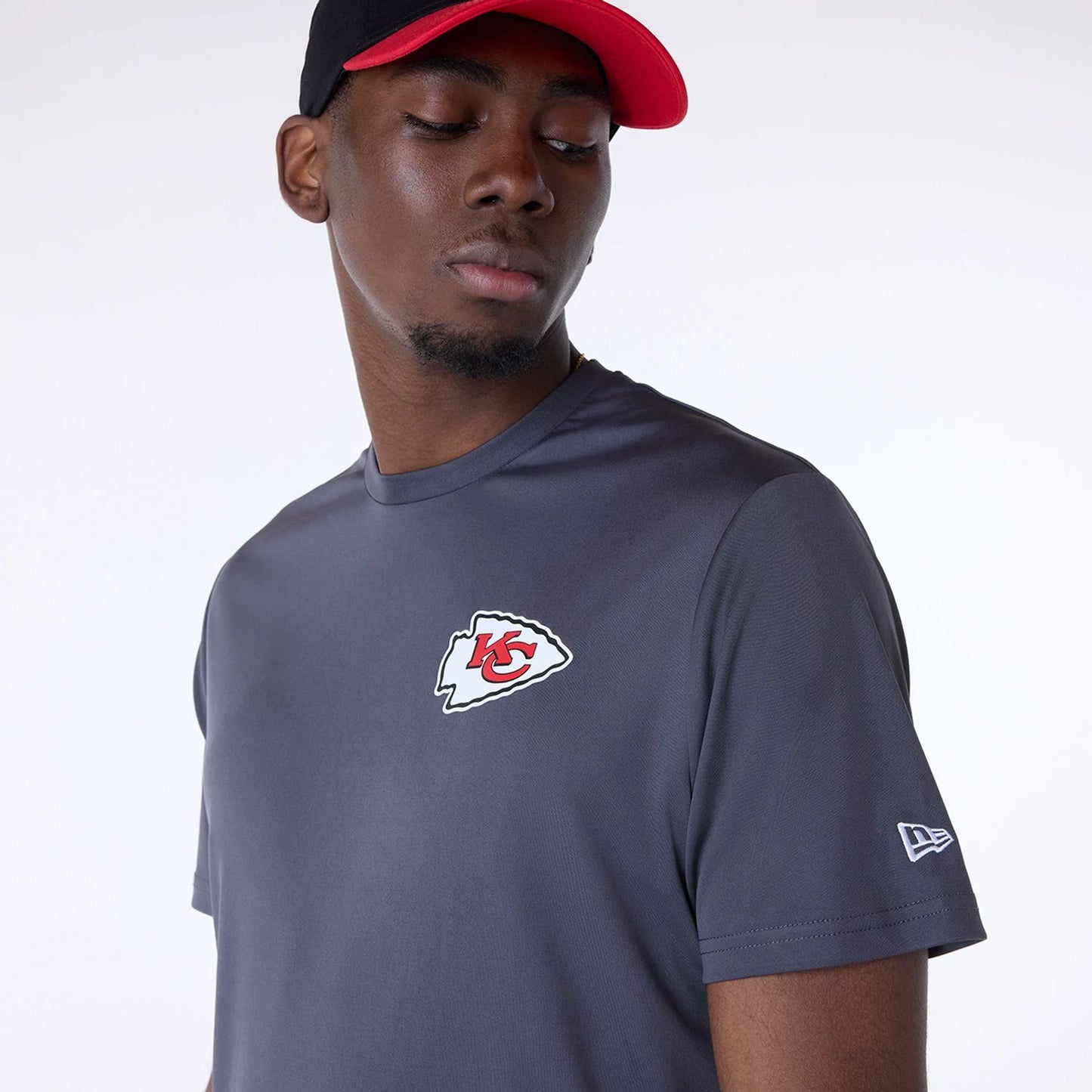 The Male model is wearing Kansas City Chiefs NFL Essentials Dark Grey T-Shirt 3