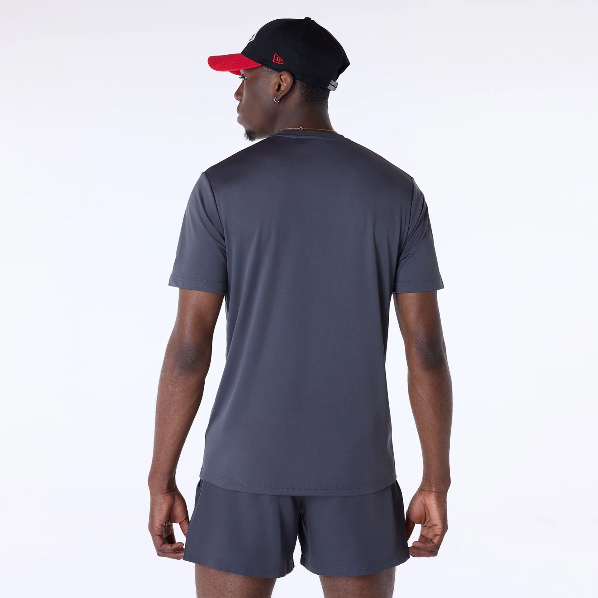 The Male model is wearing Kansas City Chiefs NFL Essentials Dark Grey T-Shirt 2