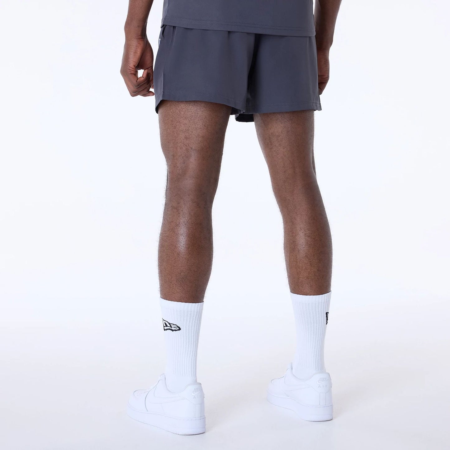 The Male model is wearing Kansas City Chiefs NFL Essentials Dark Grey Shorts 2