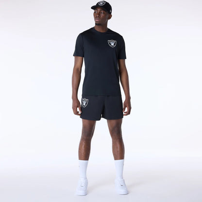 The Male model is wearing Las Vegas Raiders NFL Essentials Black Shorts 3