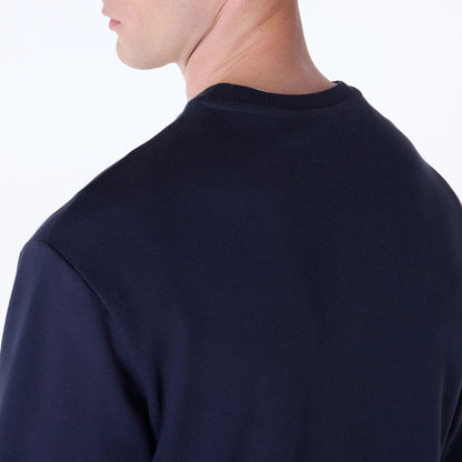 The Male model is wearing New Era Essential Navy Crew Neck Sweater 6