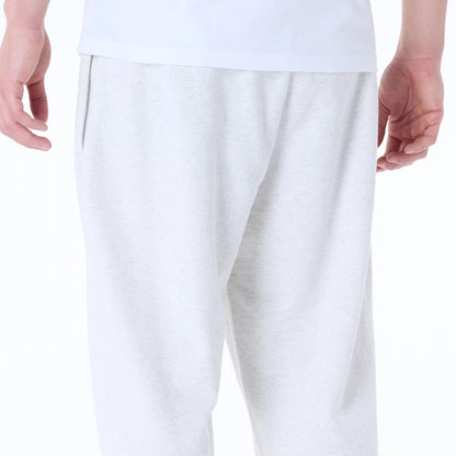 The Male model is wearing New Era Straight Pastel Grey Joggers 2