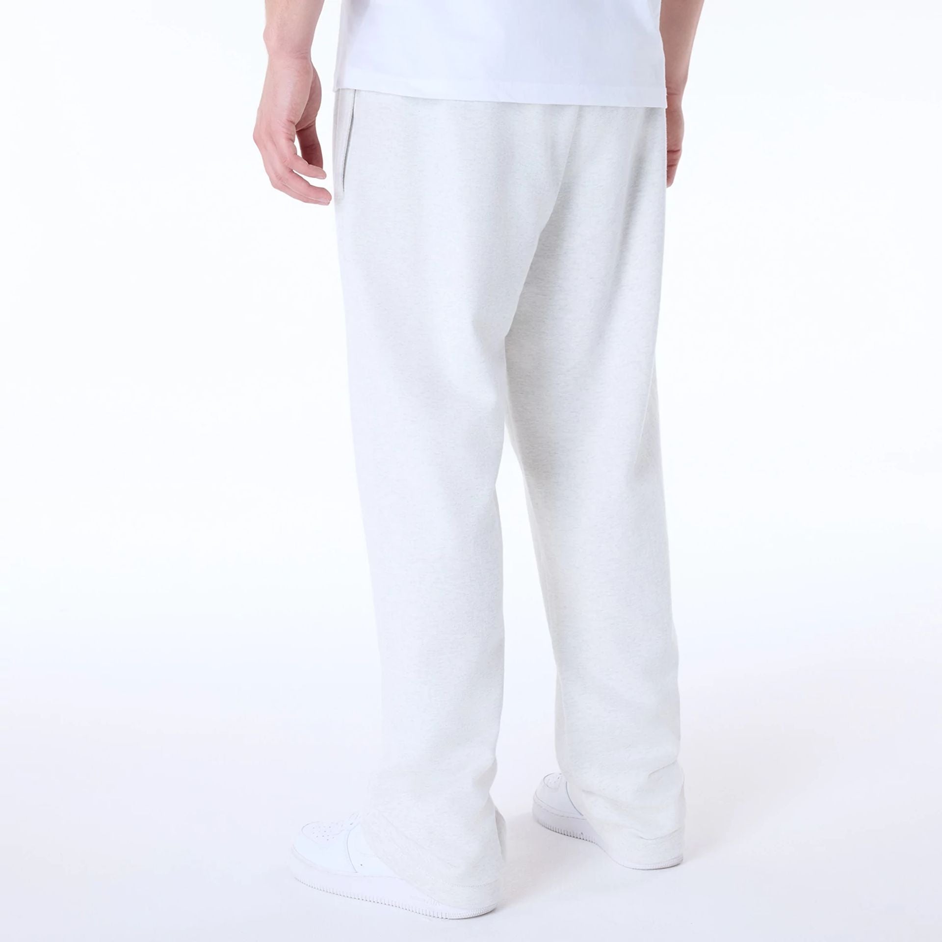 The Male model is wearing New Era Straight Pastel Grey Joggers 3