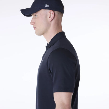 The Male model is wearing New Era Polo Navy T-Shirt 7