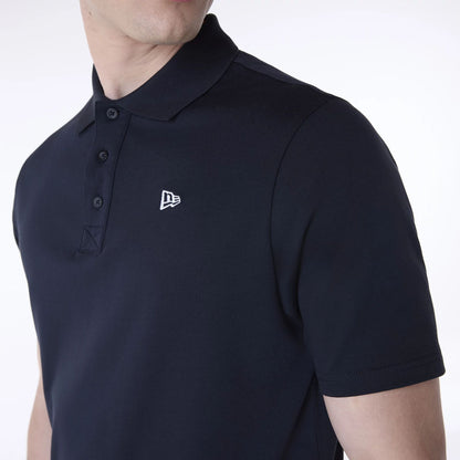 The Male model is wearing New Era Polo Navy T-Shirt 3