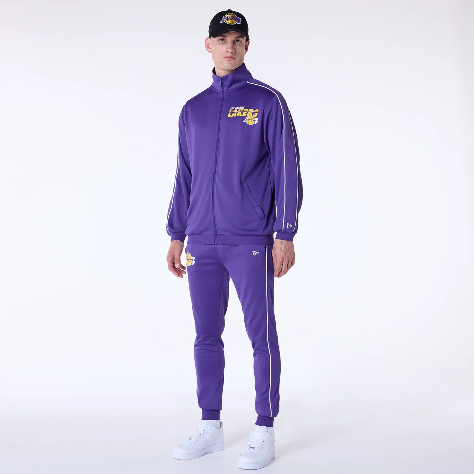 The Male model is wearing LA Lakers NBA Poly Track Set Purple Track Suit 1