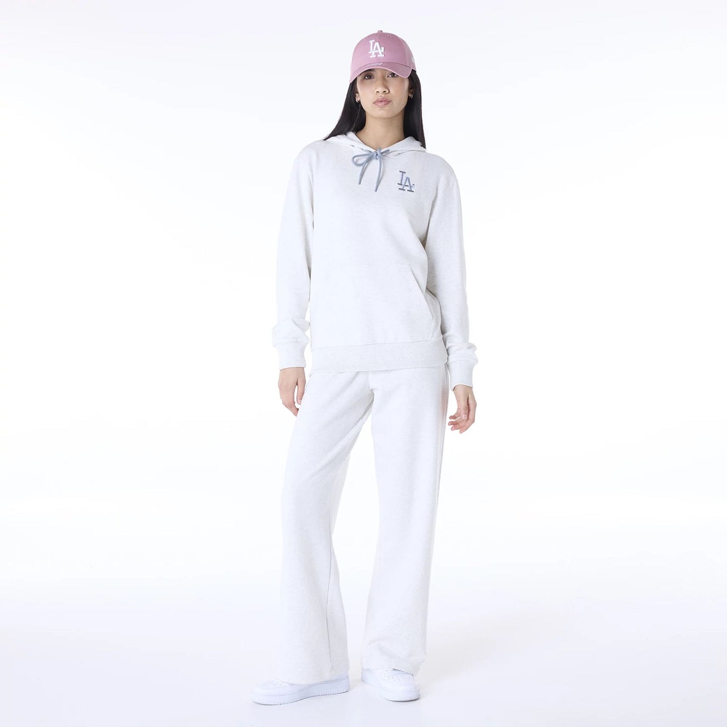 The Female model is wearing LA Dodgers MLB League Essential Pastel Grey Track Suit 1