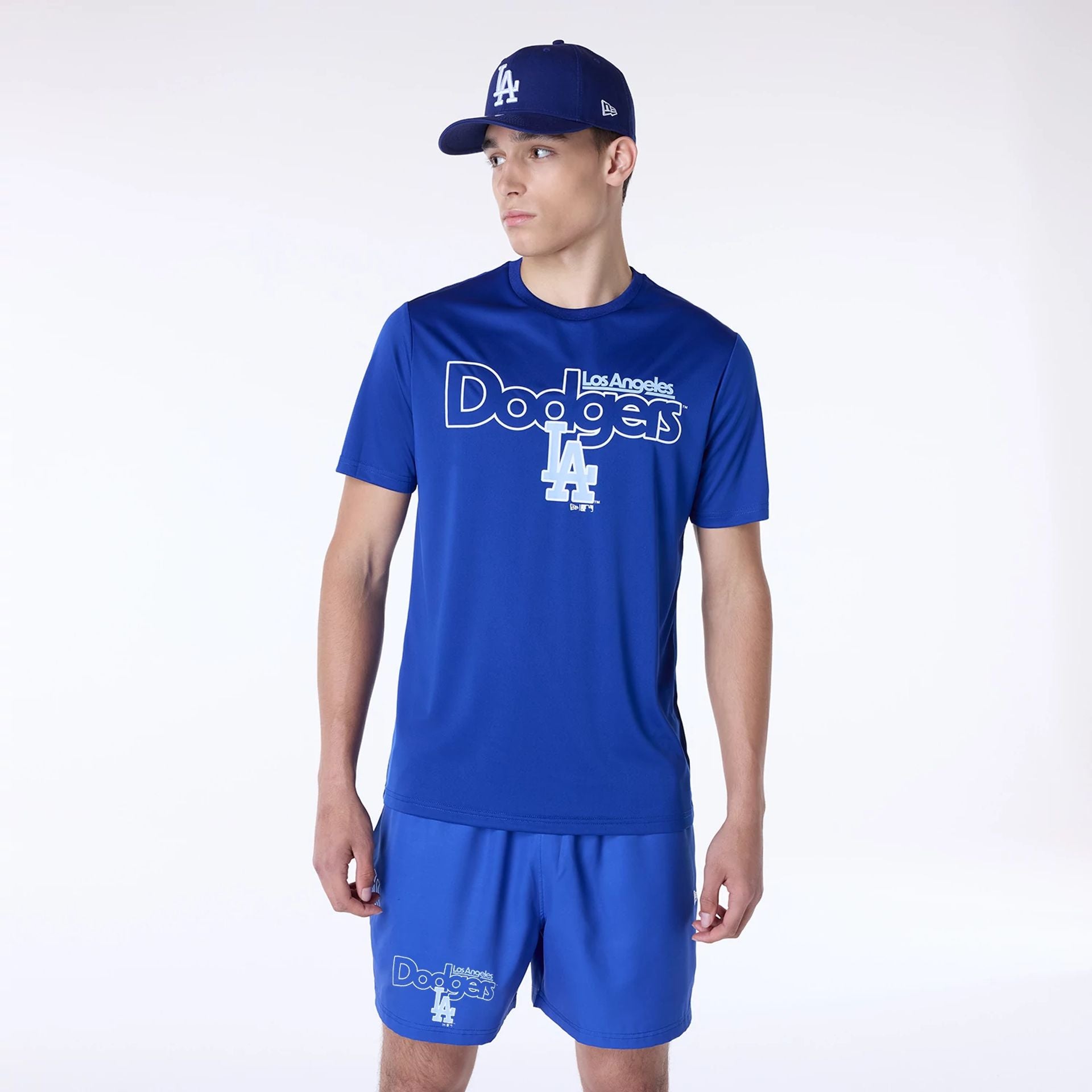 The Male model is wearing LA Dodgers MLB Essential Blue Top And Shorts Set 1