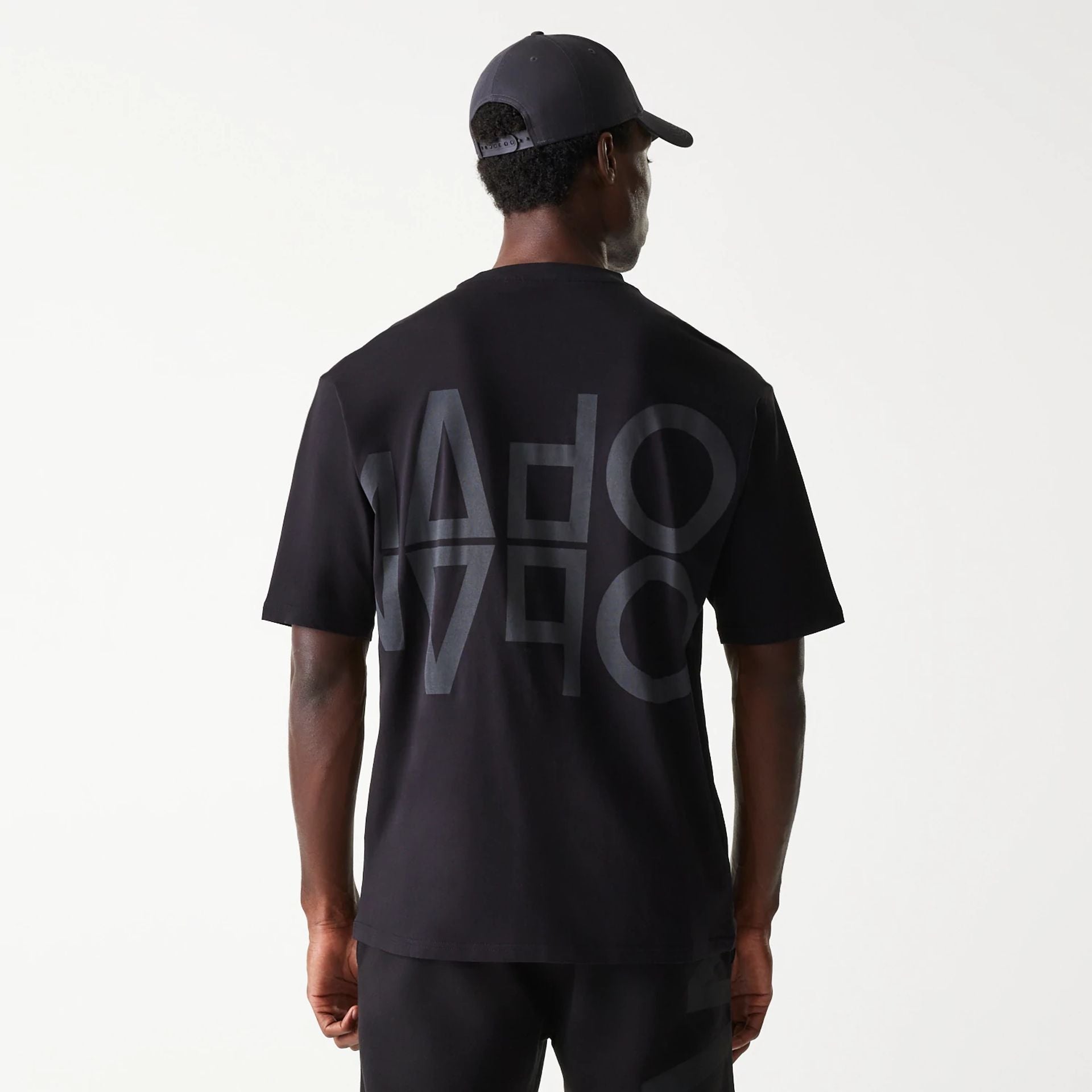 The Male model is wearing McLaren Racing Shadow Black Oversized T-Shirt 2