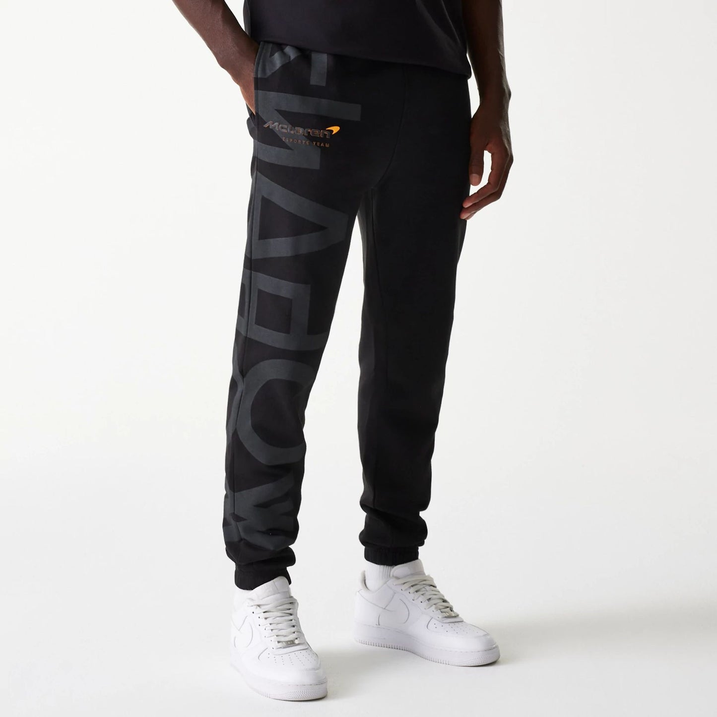 The Male model is wearing McLaren Racing Shadow Black Fleece Joggers 6