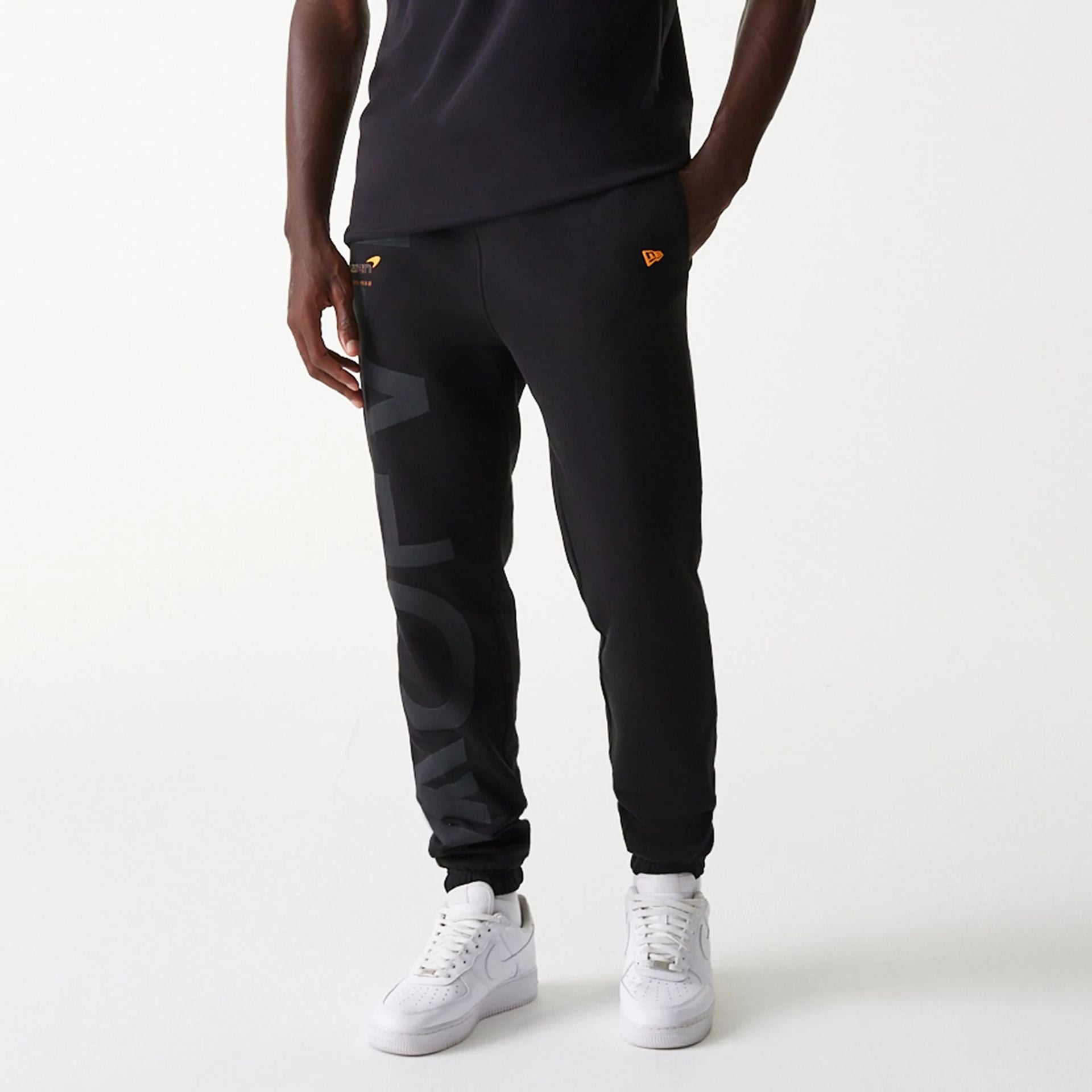 The Male model is wearing McLaren Racing Shadow Black Fleece Joggers 7