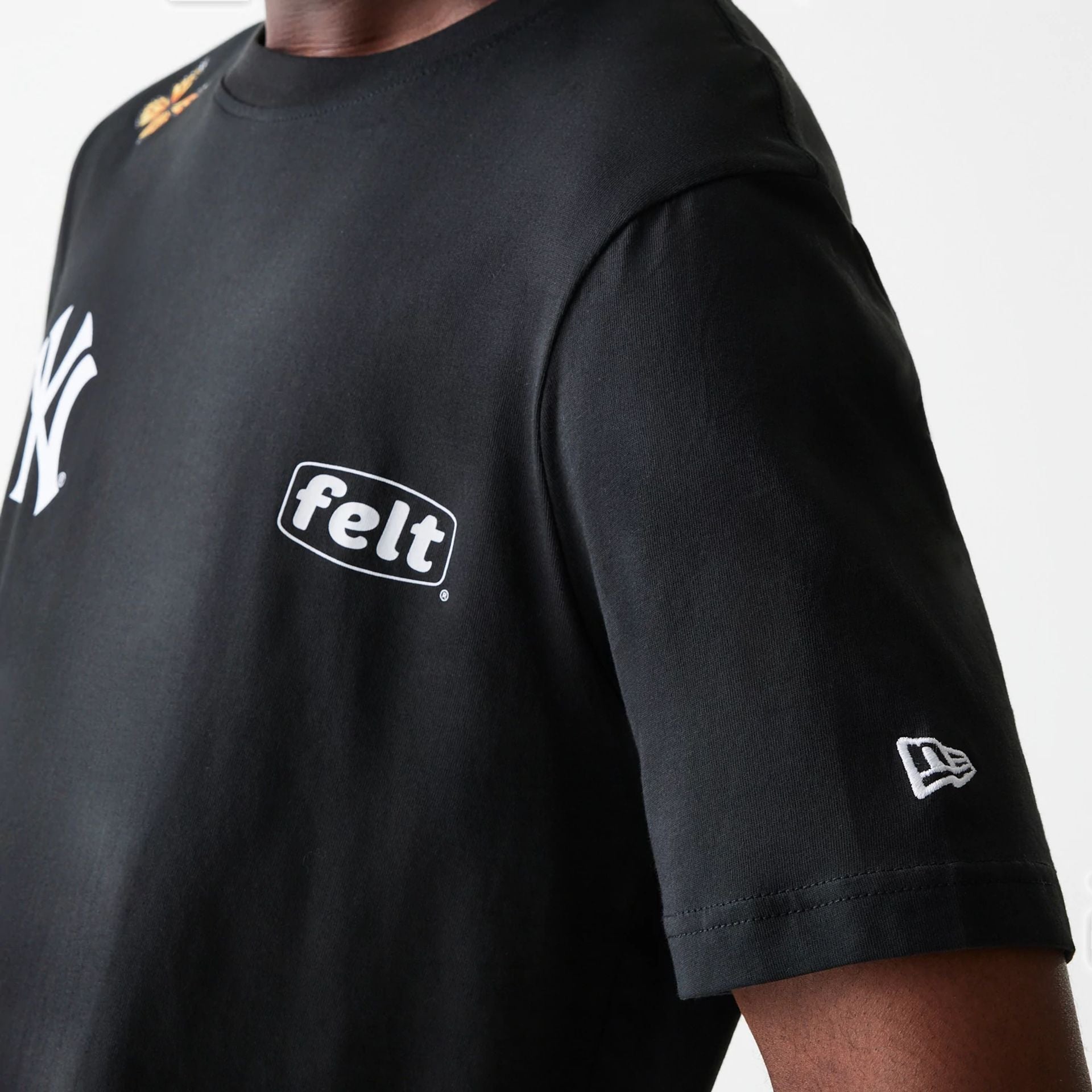 This is a New York Yankees FELT x MLB Black T-Shirt  4