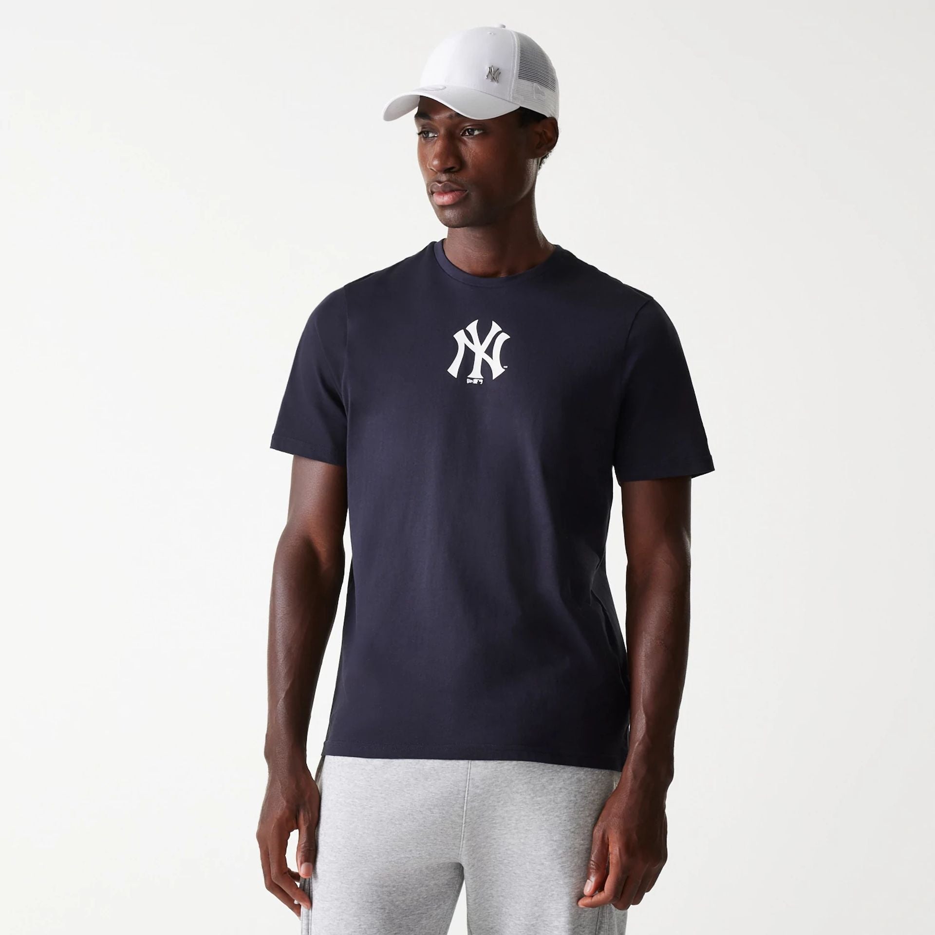 The Male model is wearing New York Yankees MLB Navy T-Shirt 1