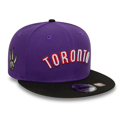 This is a Toronto Raptors NBA Classic Purple 9FIFTY Snapback Adjustable Cap 1