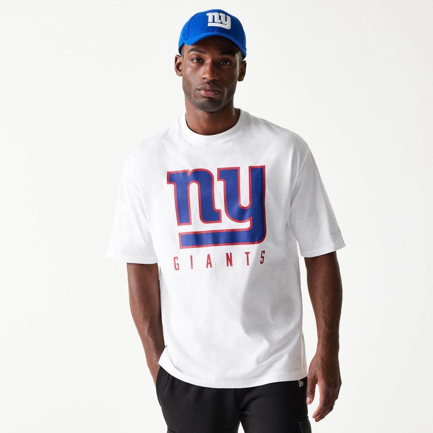 The Male model is wearing New York Giants NFL Games Slogan White Oversized T-Shirt 1