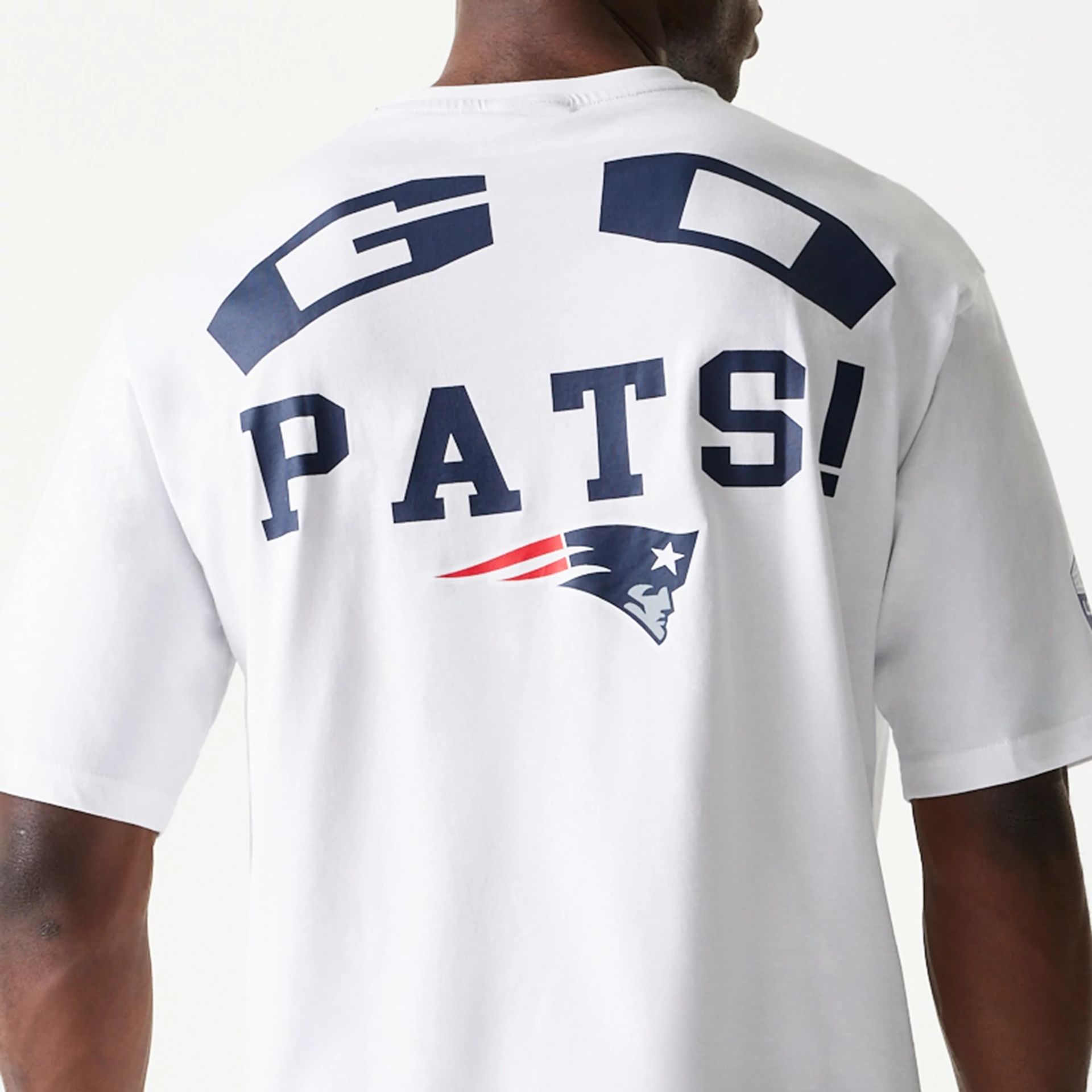 The Male model is wearing New England Patriots NFL Games Square Arch White Oversized T-Shirt 6