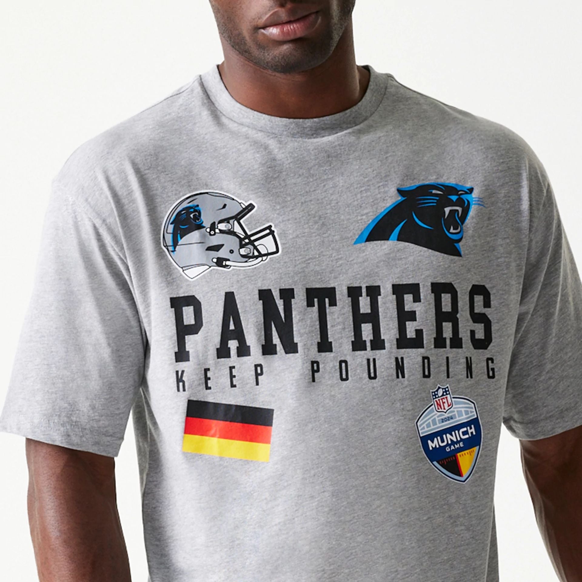 The Male model is wearing Carolina Panthers NFL Games Collegiate Grey Oversized T-Shirt 2