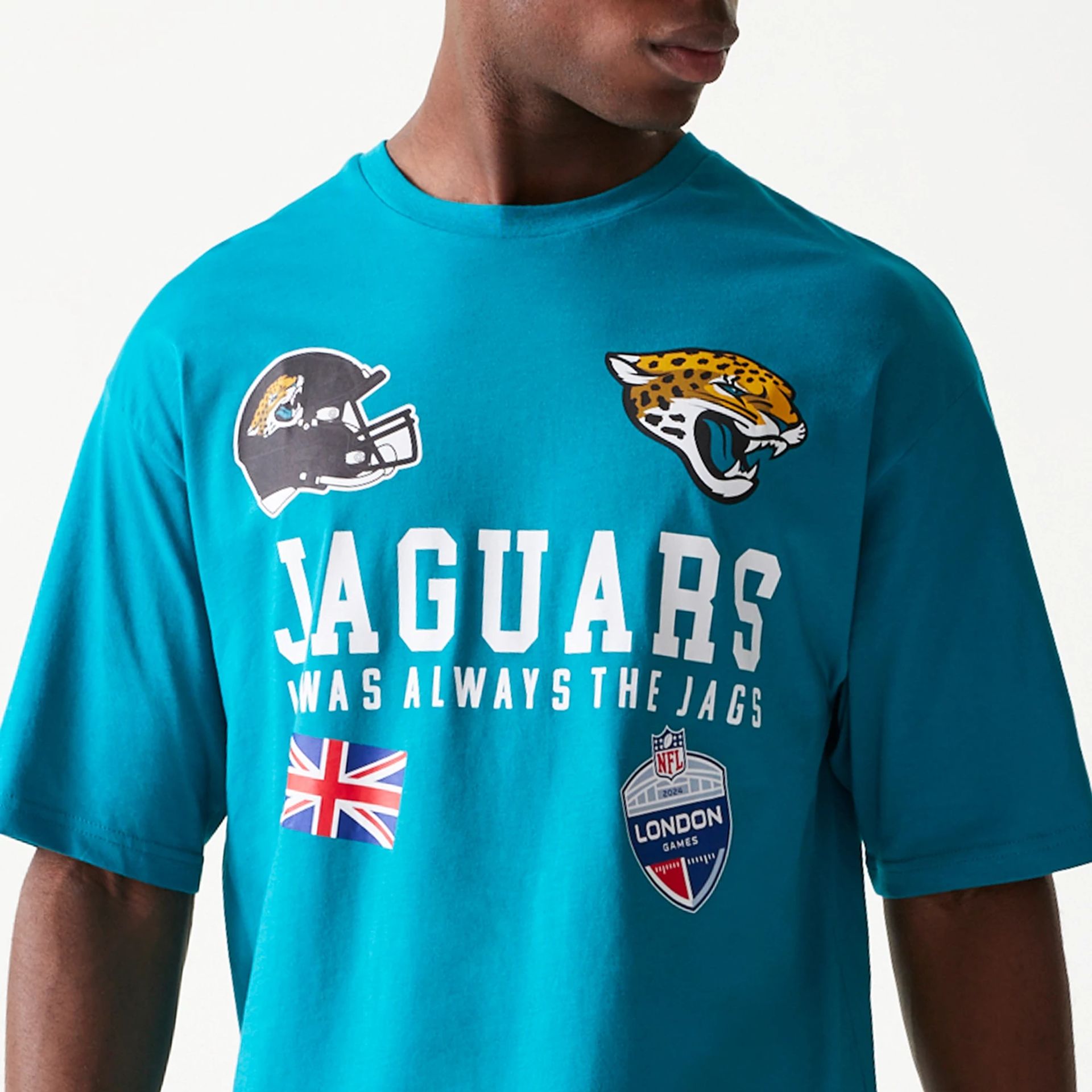 The Male model is wearing Jacksonville Jaguars NFL Games Collegiate Turquoise Oversized T-Shirt 2