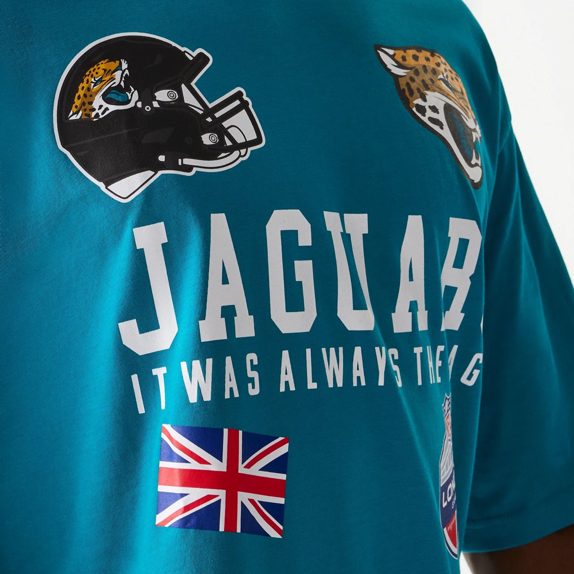 The Male model is wearing Jacksonville Jaguars NFL Games Collegiate Turquoise Oversized T-Shirt 3