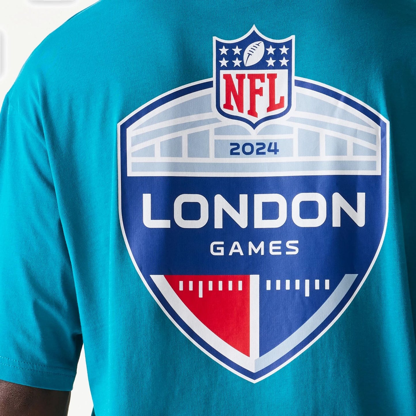 The Male model is wearing Jacksonville Jaguars NFL Games Collegiate Turquoise Oversized T-Shirt 5