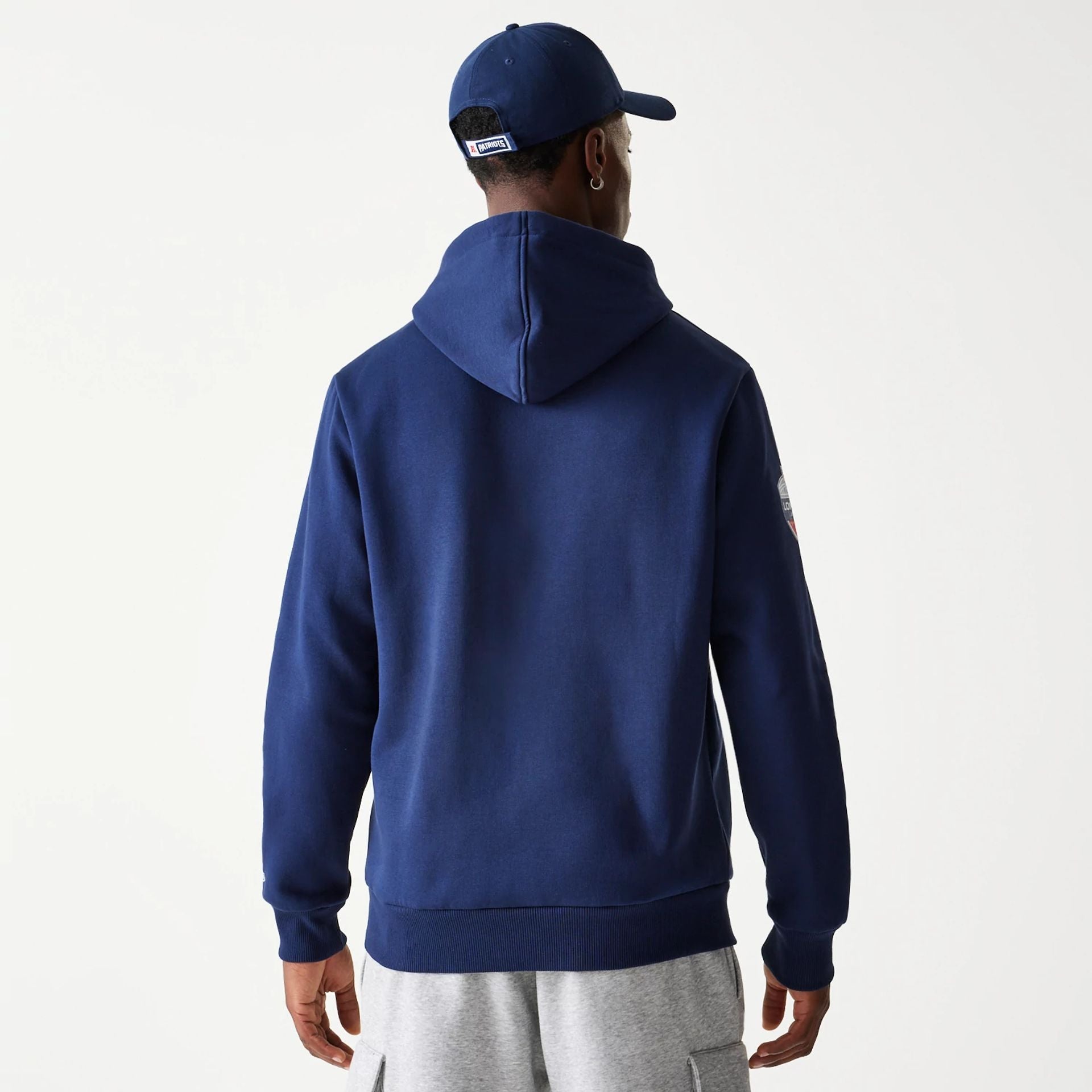 The Male model is wearing New England Patriots NFL Games Slogan Dark Blue Pullover Hoodie 7