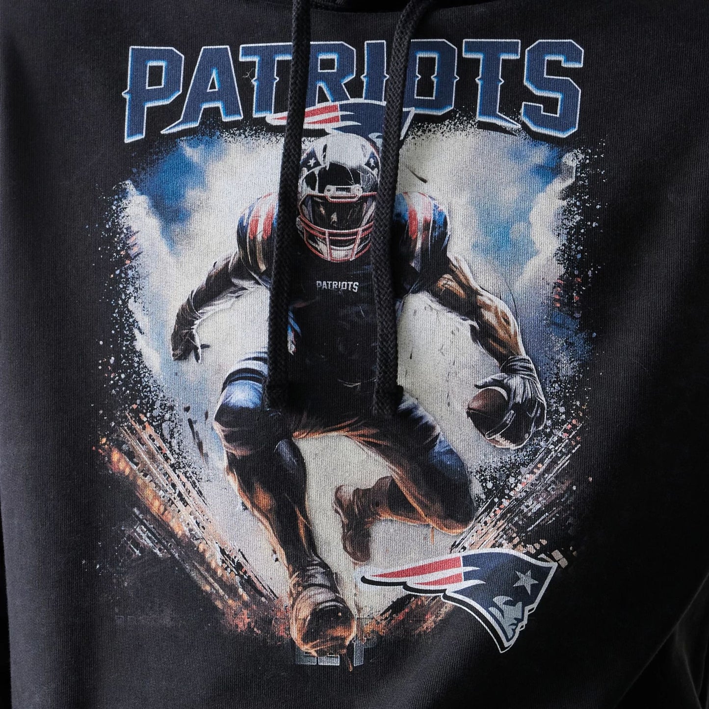 The Male model is wearing New England Patriots NFL Games Premium Apparel Black Oversized Pullover Hoodie 5