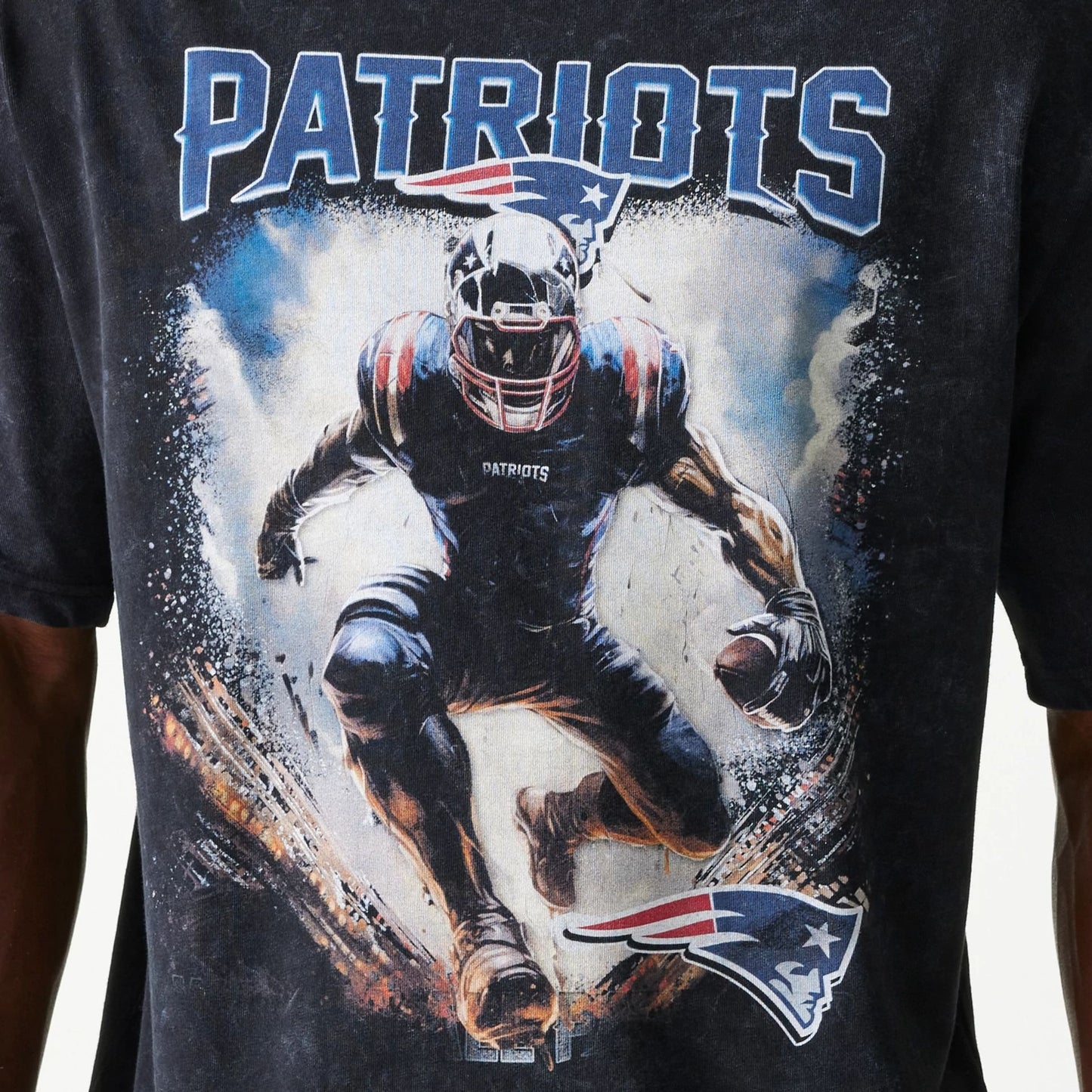 The Male model is wearing New England Patriots NFL Games Premium Apparel Black Oversized T-Shirt 5