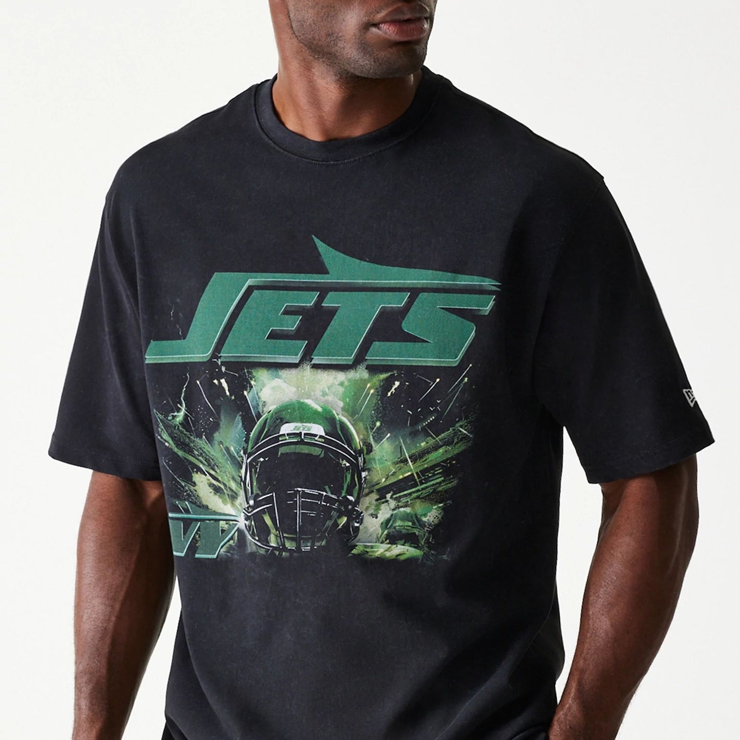 The Male model is wearing New York Jets NFL Games Premium Apparel Black Oversized T-Shirt 2