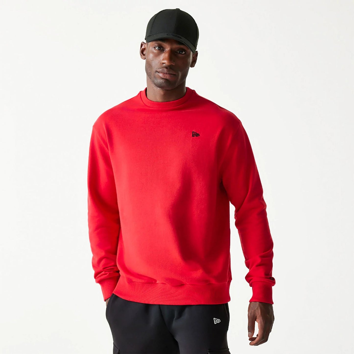 The Male model is wearing New Era Essential Red Crewneck Sweater 1