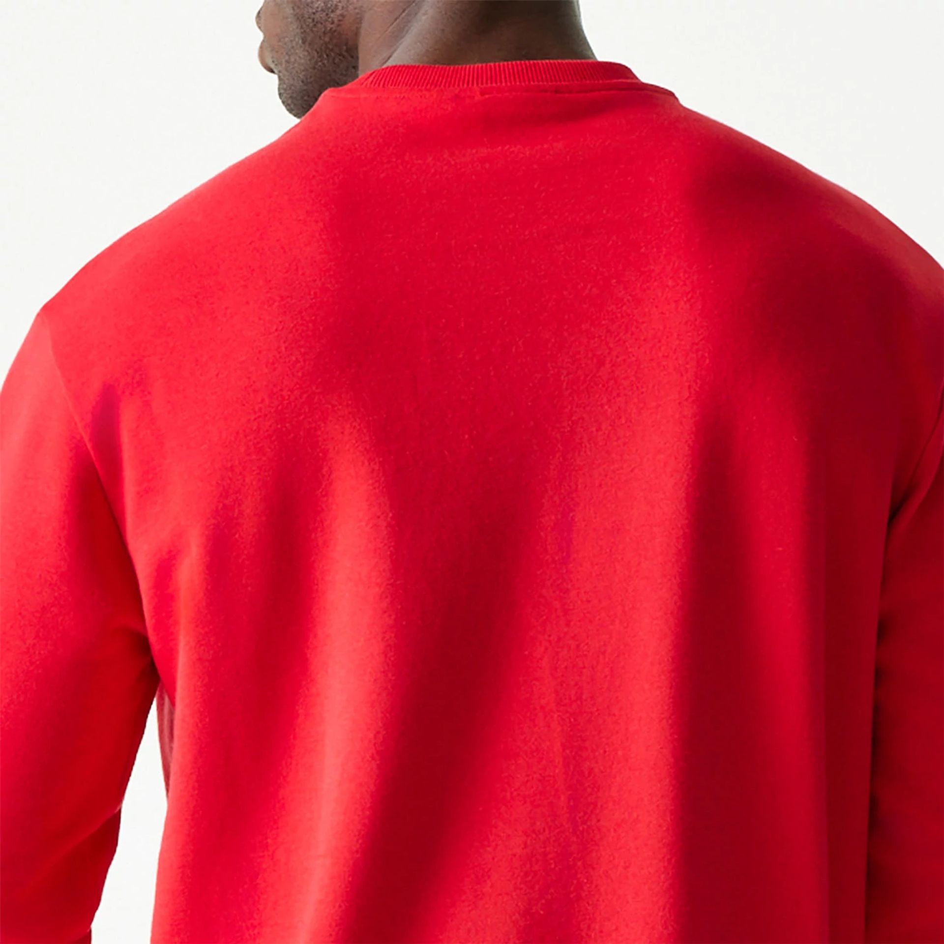 The Male model is wearing New Era Essential Red Crewneck Sweater 7