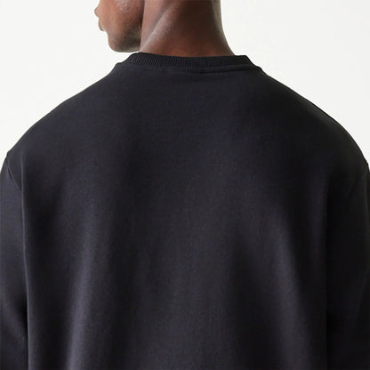 The Male model is wearing New Era Essential Black Crewneck Sweater 7