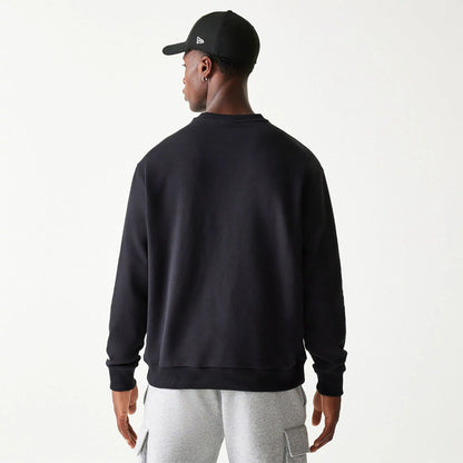 The Male model is wearing New Era Essential Black Crewneck Sweater 2