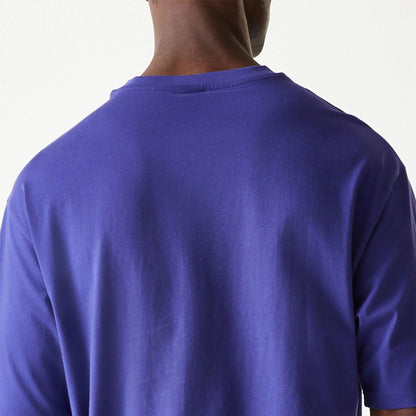 The Male model is wearing New Era Essential Dark Purple Oversized T-Shirt 7